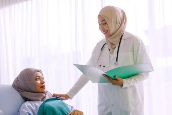 muslim-female-doctor-taking-care-patient-muslim-female-doctor-taking-care-patient-hospital-room-184544508-transformed